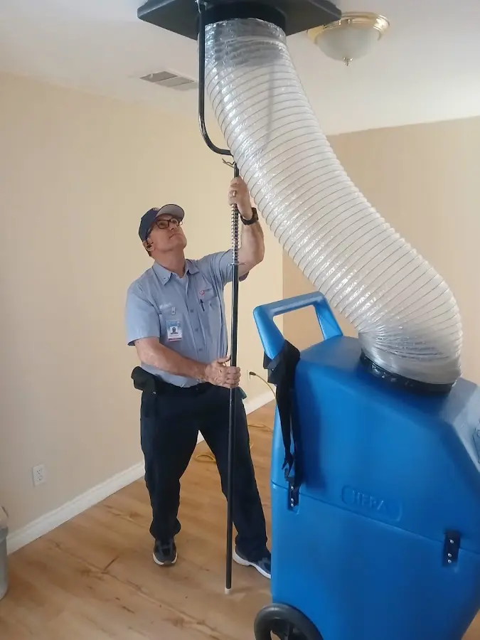 Furnace Tune-Up technician using HEPA equipment in Canyon Lake